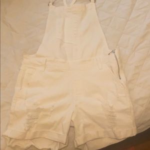 A cute white romper, never worn.